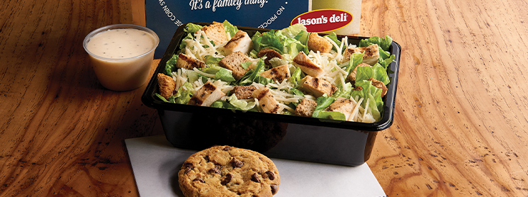 https://www.jasonsdeli.com/sites/default/files/Chicken%20Caesar%20Salad%20Box%20with%20Chocolate%20Chip%20Cookie%2061520jf.png